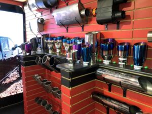 colourful assortment of exhaust tips in edmonton auto repair shop, sherwood park