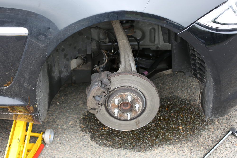 Brake Fluid Leak with wheel taken off to reveal brake disc