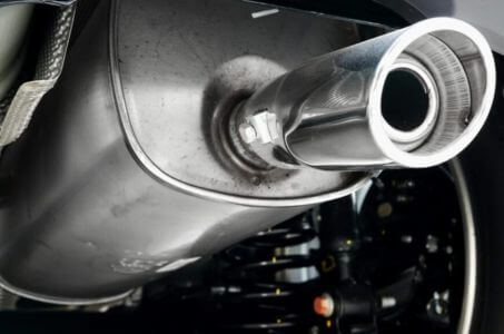 Close-up of car exhaust muffler system