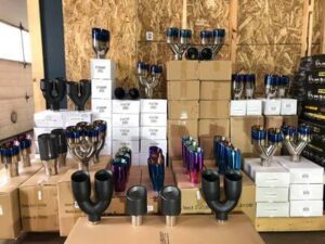 selection of exhaust tips in different finishes ready for installation